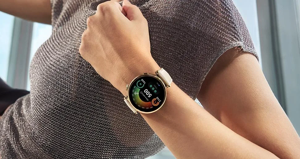 Smartwatch on wrist showing fitness data